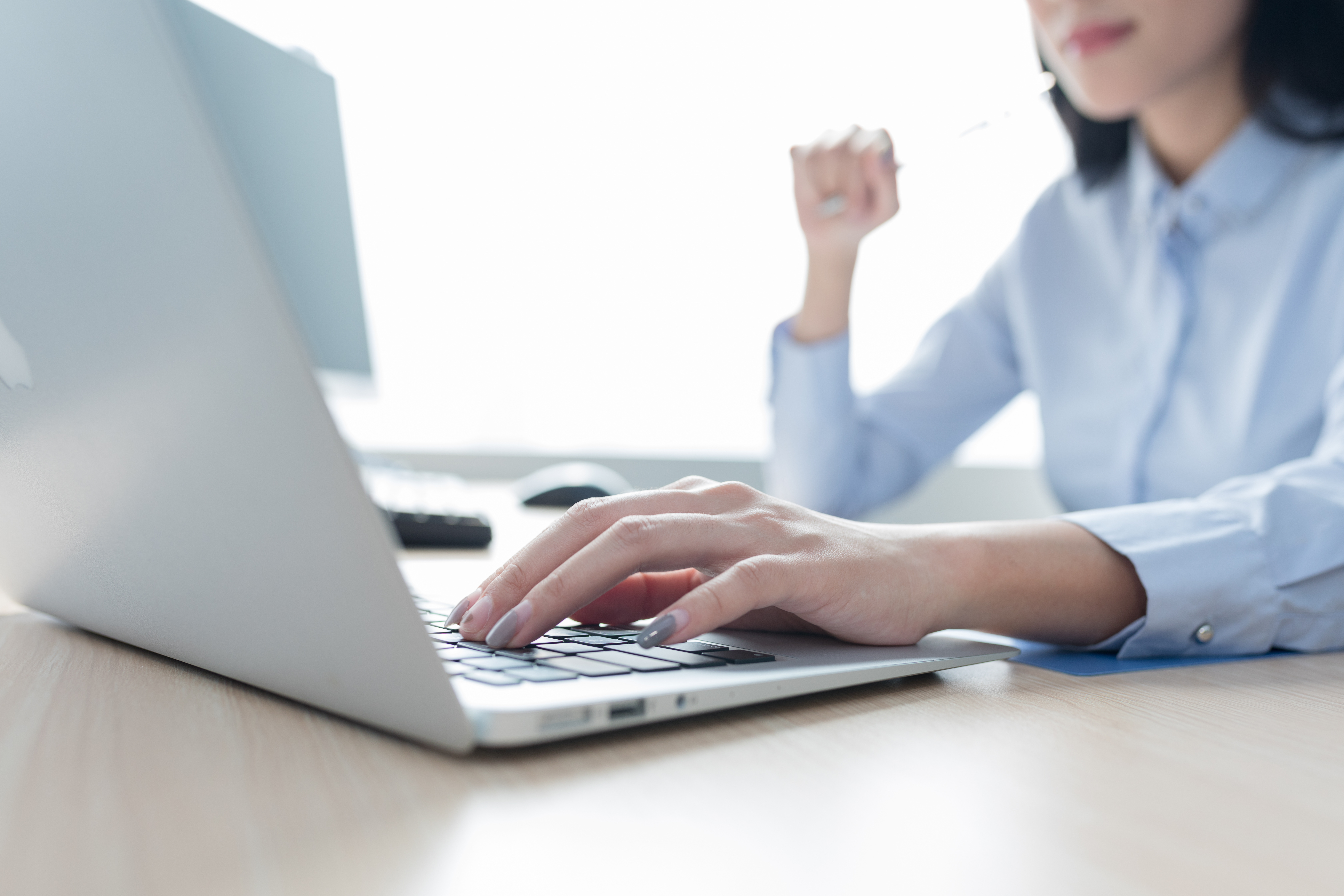 Lovepik_com-500709615-working-hand-close-up-while-typing-using-a-computer.jpg