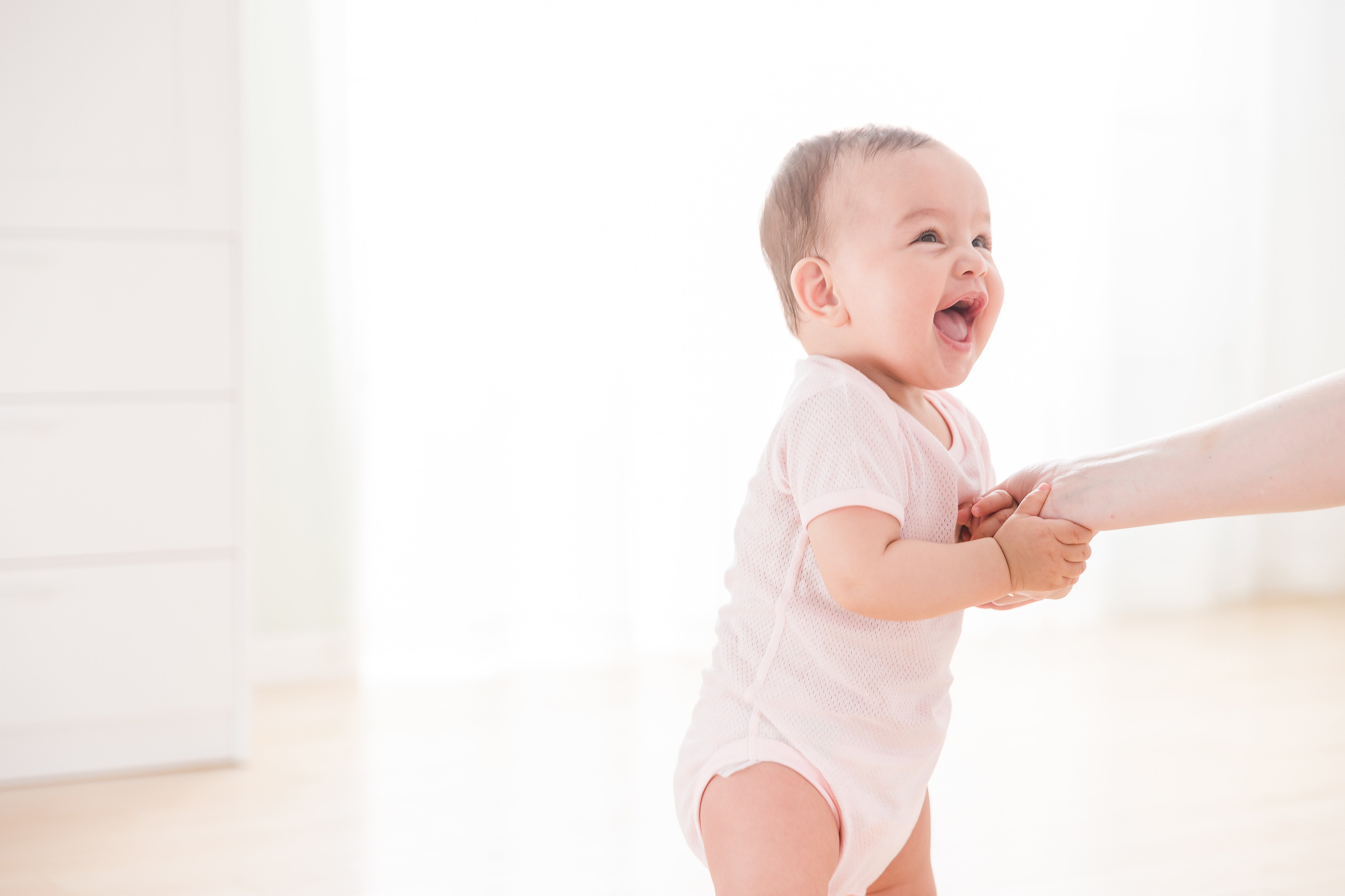 Lovepik_com-501346806-maternal-and-child-foreign-baby-standing.jpg
